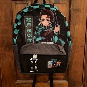 Demon Slayer Tanjiro book bag with black and green checker board details